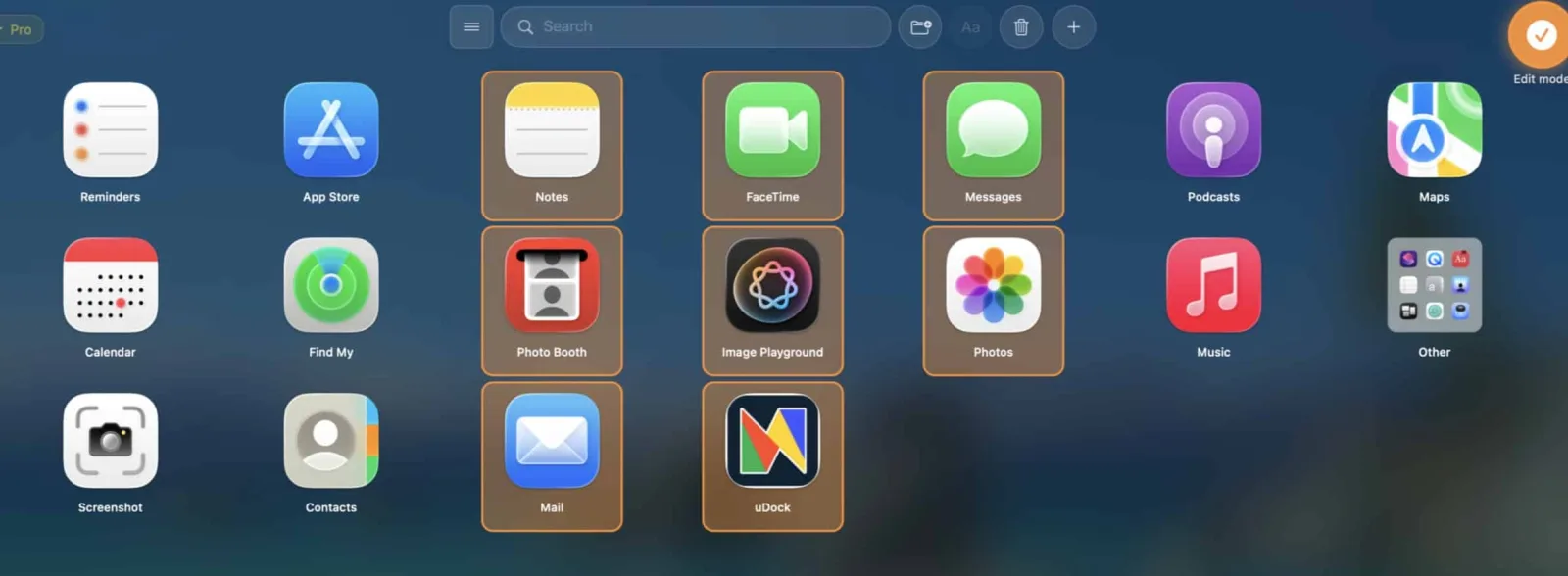 Multiple applications selected with orange outlines in AppGrid Edit mode, with the create-folder button visible in the toolbar